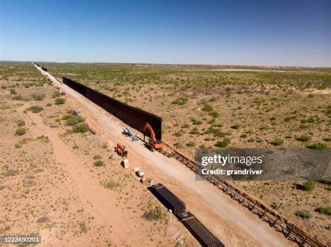 international border barrier stock  high res pictures