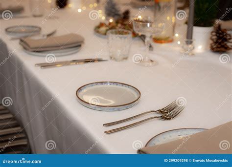 Elegant Dining Table Decor with Candle, Plant, and Place Setting Stock ...