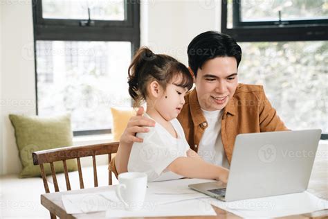 Image of Asian father and daughter at home 22494945 Stock Photo at Vecteezy