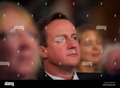 Prime Minister David Cameron listens to speeches on the first day of ...