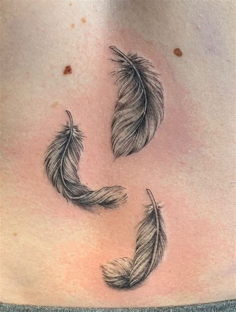 Delicate feather tattoo – Artofit