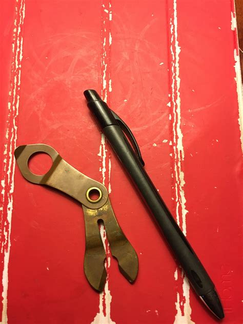 brass tool forked    thick holed   thin  flexible