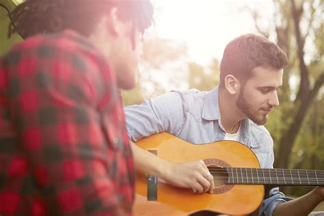 person playing guitar  stock photo