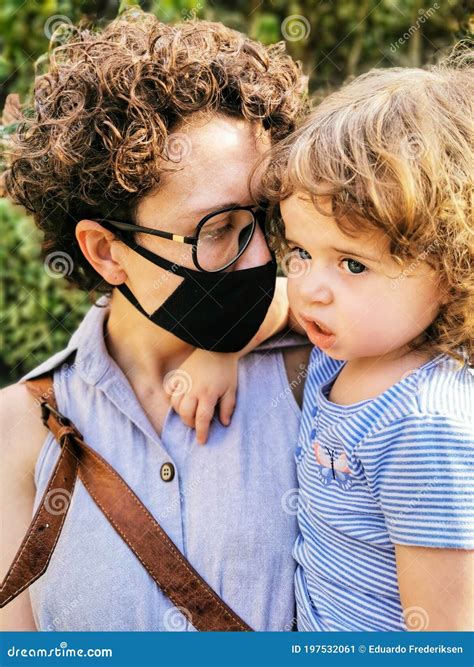 Brazilian Mother Wearing Mask Taking Care of Daughter in Quarantine