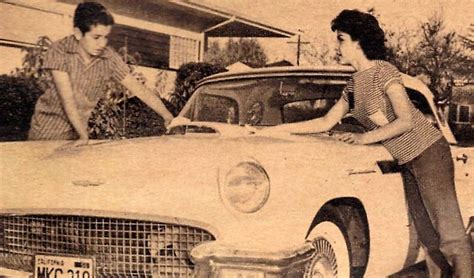 Annette and her brother cleaning her Thunderbird ... wonder how much ...