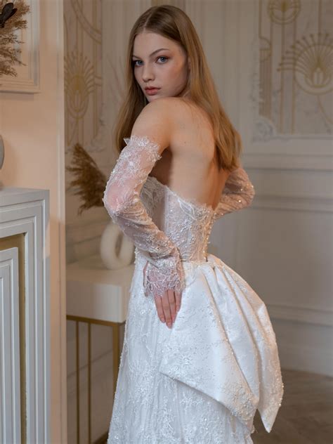 Sheath wedding gown with detachable long sleeves and accent bow