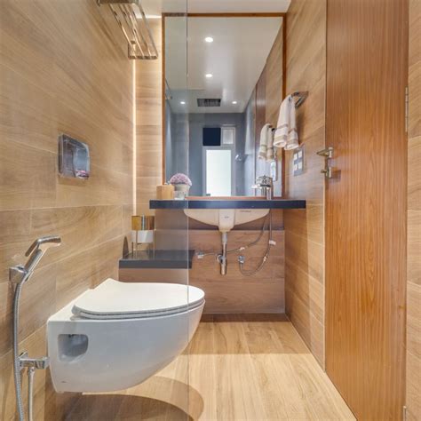 Compact Wooden Bathroom Design With Retangular Mirror - 7X6 Ft | Livspace