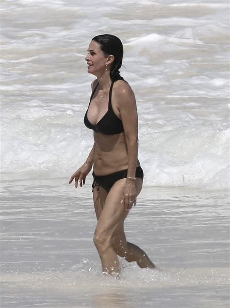 COURTENEY COX in Bikini on the Beach in Bahamas 04/02/2017 – HawtCelebs