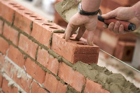 Bricklayer Building Wall Stock Photo - Download Image Now - iStock