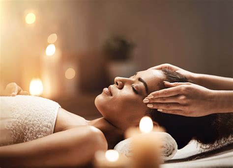 Download A Woman Getting A Massage In A Spa | Wallpapers.com