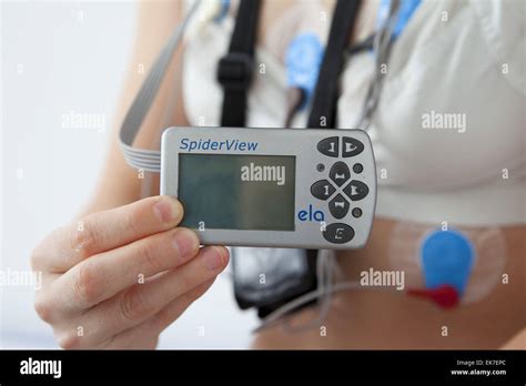 Holter monitor woman Stock Photo - Alamy