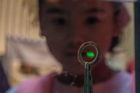 A team studying quantum physics caught a tiny dust particle floating in