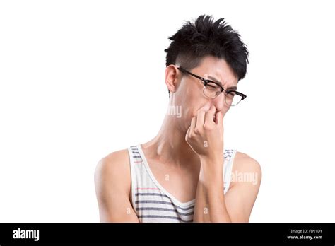 portrait  young man holding nose stock photo alamy