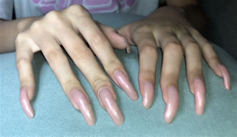 Pin by ian jobling on Quick Saves | Long natural nails, Curved nails ...