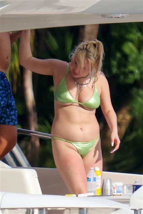 Kim Petras seen wearing a green bikini while enjoying a fun day with ...