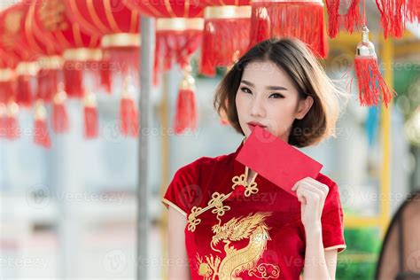 Portrait beautiful asian woman in Cheongsam dress,Thailand people,Happy