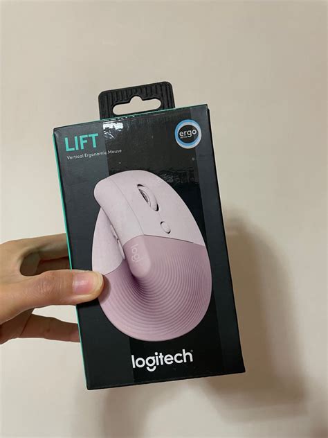 Logitech vertical pink mouse, Computers & Tech, Parts & Accessories, Mouse & Mousepads on Carousell