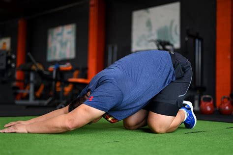 Kneeling Upper Back Stretch. Place yourself on your knees n a kneeling