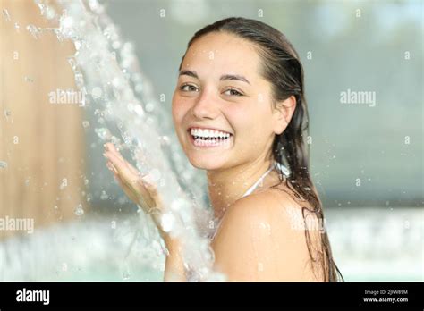 Woman enjoying bath swimming pool hi-res stock photography and images
