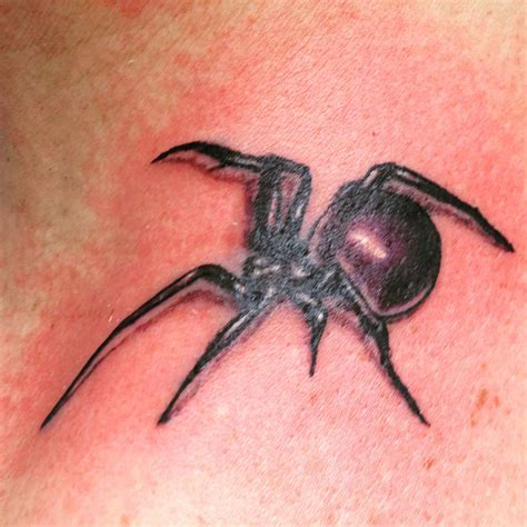 joehinestattoo:black-widow-spider-tattoo
