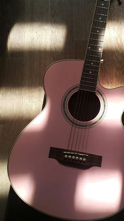 pink acoustic guitar  wooden floor pink guitar wallpaper aesthetic