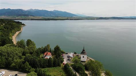 Aerial view of St. Mary church at Liptovska Mara in Slovakia in August