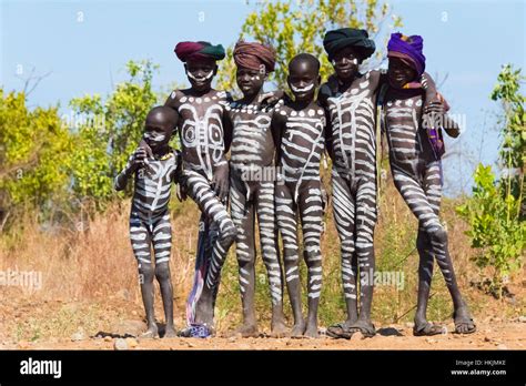 Mursi tribe boys with painted body, Mursi Village, South Omo, Ethiopia ...