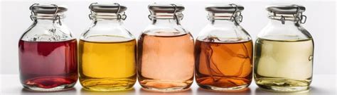 premium ai image  small bottles  liquid  lined    row