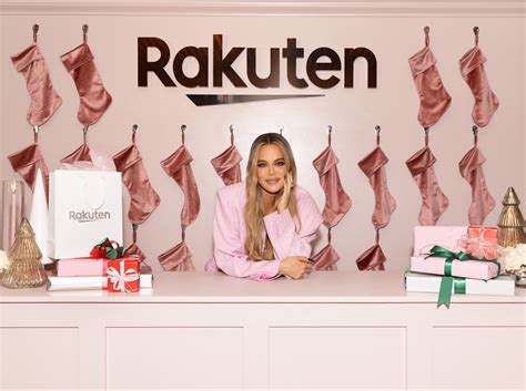 Khloé Kardashian gets into holiday spirit with blinged-out bra and pink