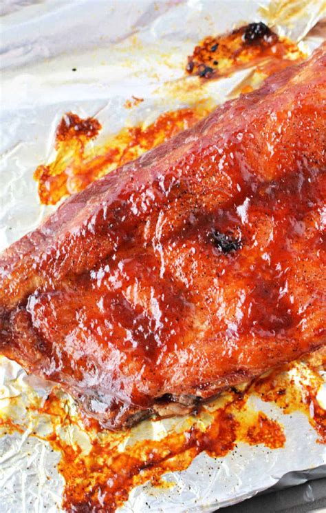 how long to slow cook ribs in oven