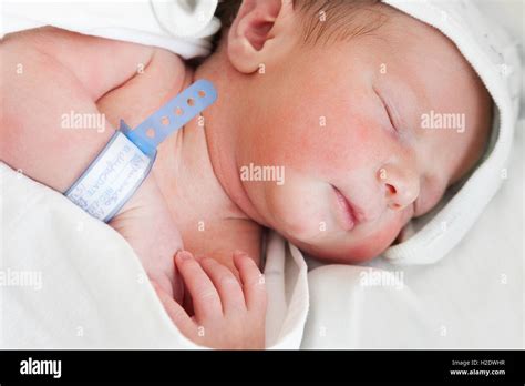 Little cute newborn baby child sleeping Stock Photo - Alamy