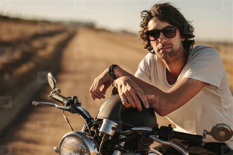 Man on motorcycle at countryside stock photo (150394) - YouWorkForThem