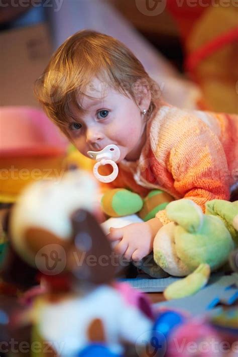 child playing with toys at home 11262604 Stock Photo at Vecteezy