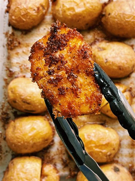 oven roasted crispy parmesan crusted potatoes easy  pan side dish