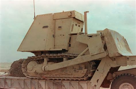 An Armored Bulldozer Similar To The Ones Used In The Image Free Photo