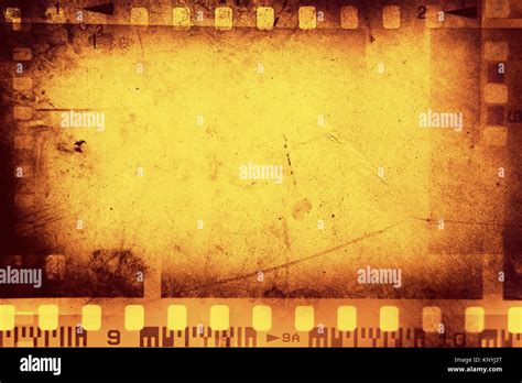 Film negative frames on orange background Stock Photo - Alamy