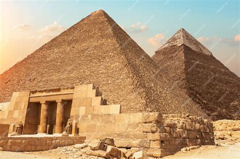 Premium Photo | Mastaba of seshemnefer iv and the pyramids of giza, egypt.