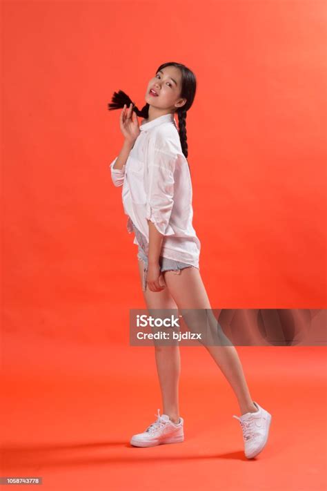 Cute And Naughty Asian Girl Stock Photo - Download Image Now - 20-29