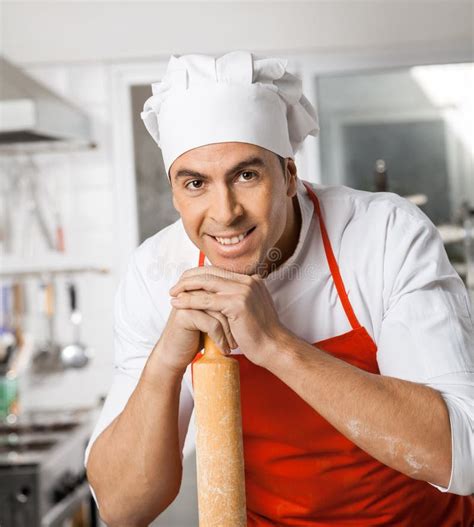 Portrait of Happy Chef Leaning on Rolling Pin Stock Image - Image of ...