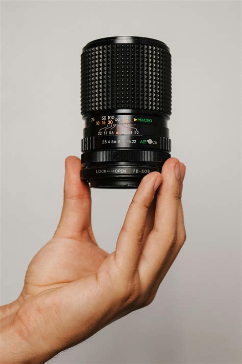 A Brown and Silver Samsung Nx300 Camera · Free Stock Photo