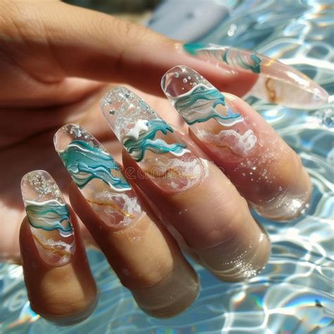 close   beach themed nail art featuring clear  translucent nails