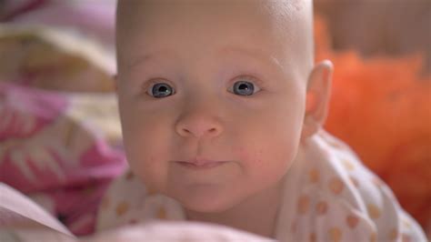 Portrait of baby girl with big blue smiling eyes 28764617 Stock Video ...
