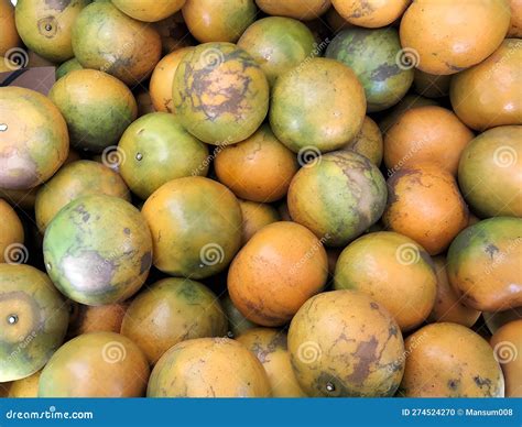 Fresh Yellow Orange Fruit in the Market Stock Photo - Image of market ...