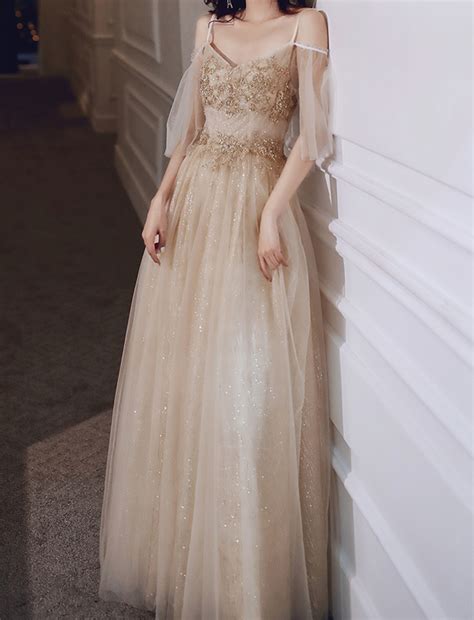 White And Gold Ball Gowns