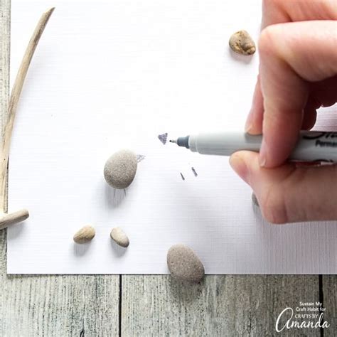 Pebble Art: create your own DIY pebble art birds on a branch!