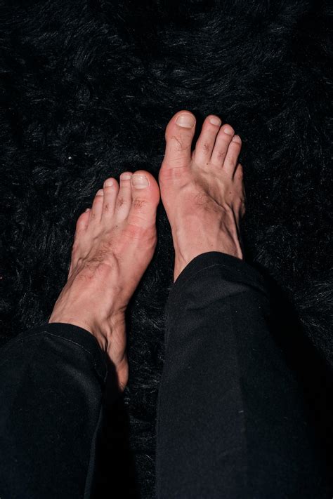 My veiny feet on a fluffy mat, ready for some attention. Feels so soft