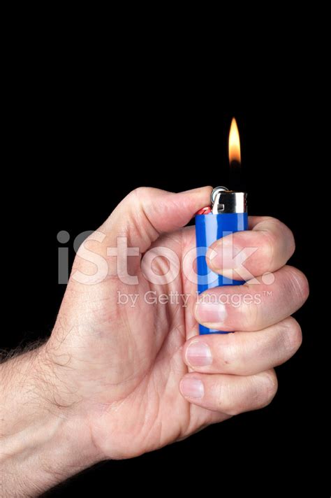 Lit Butane Lighter Stock Photo | Royalty-Free | FreeImages