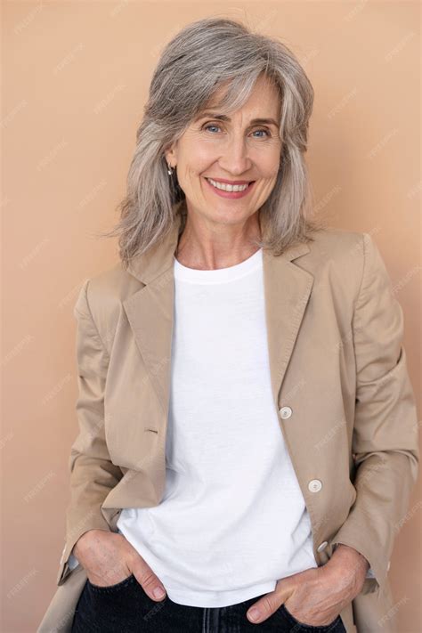 Free Photo | Portrait of elegant older woman posing and being happy