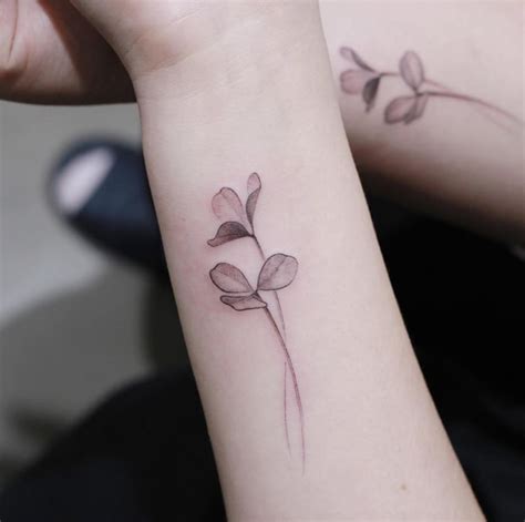 35 Artistic Shamrock and Four-Leaf Clover Tattoos - TattooBlend