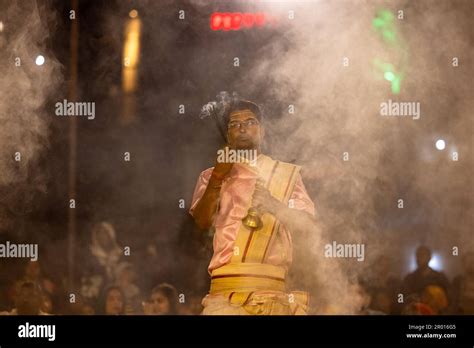 Ganga aarti, Portrait of an young priest performing river ganges ...